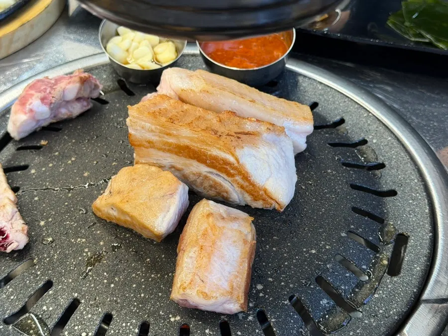 A bite of rice wrapped in roasted seaweed