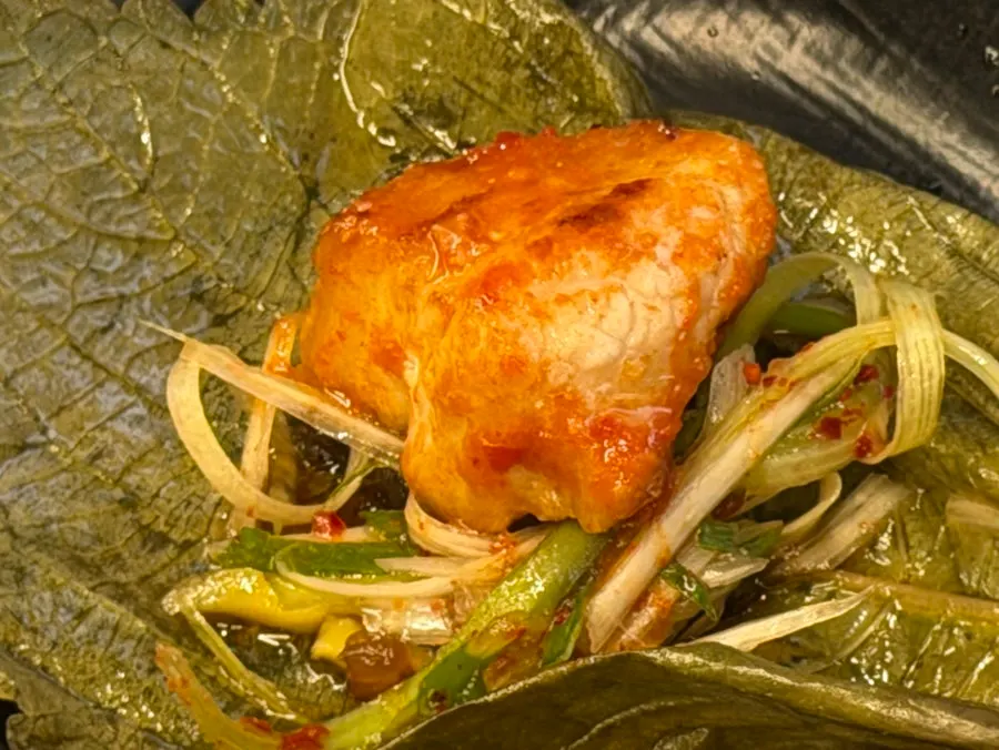 A combo of pickled radish, kelp, and meat