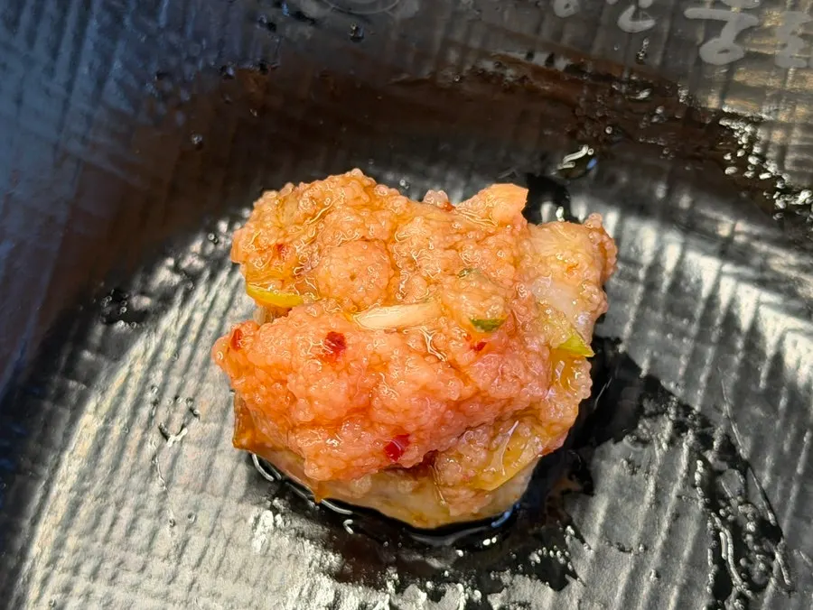 Meat dipped in hairtail jeotgal with perilla leaf and ginger