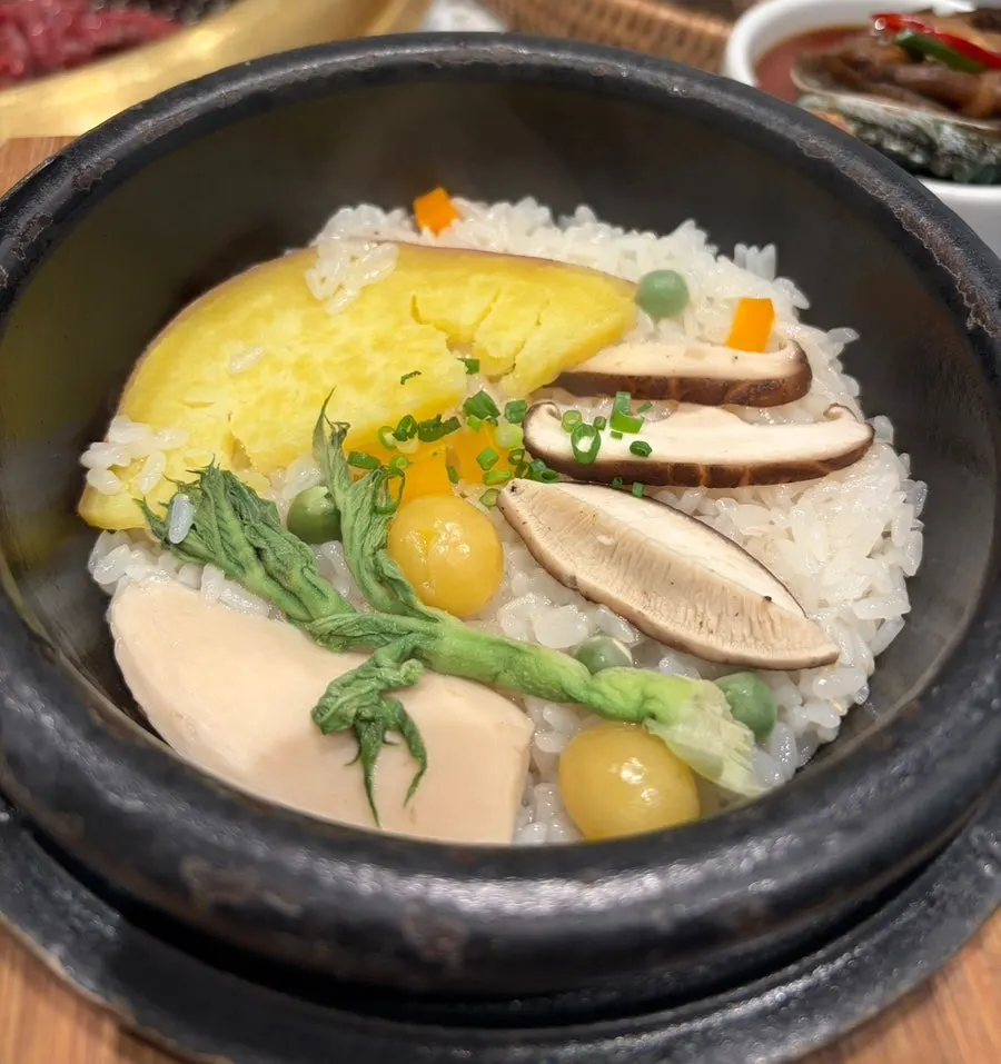 Neatly arranged Moyeon side dishes including perilla leaf pesto