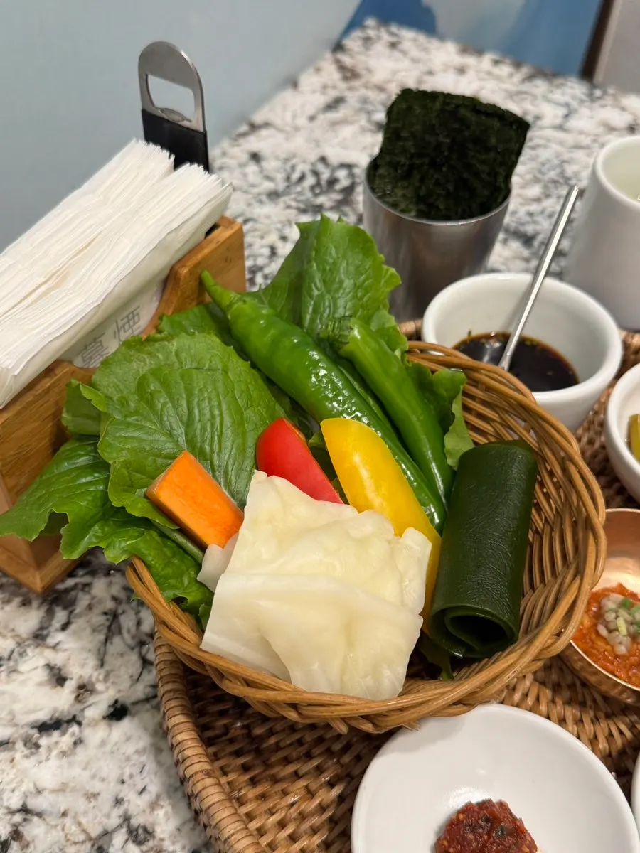 Side dishes of raw carrots and raw paprika