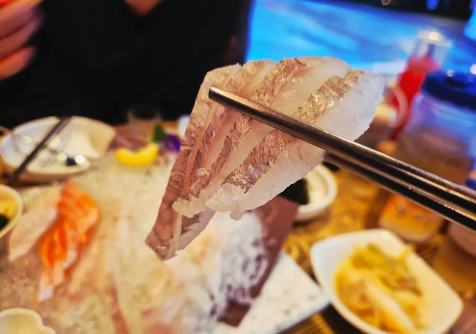 Generously served plate of raw fish