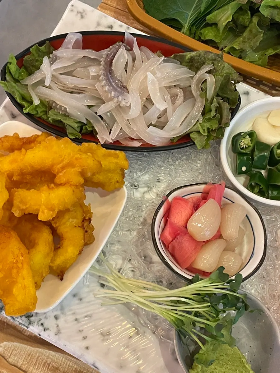 Close-up of a plate of squid sashimi