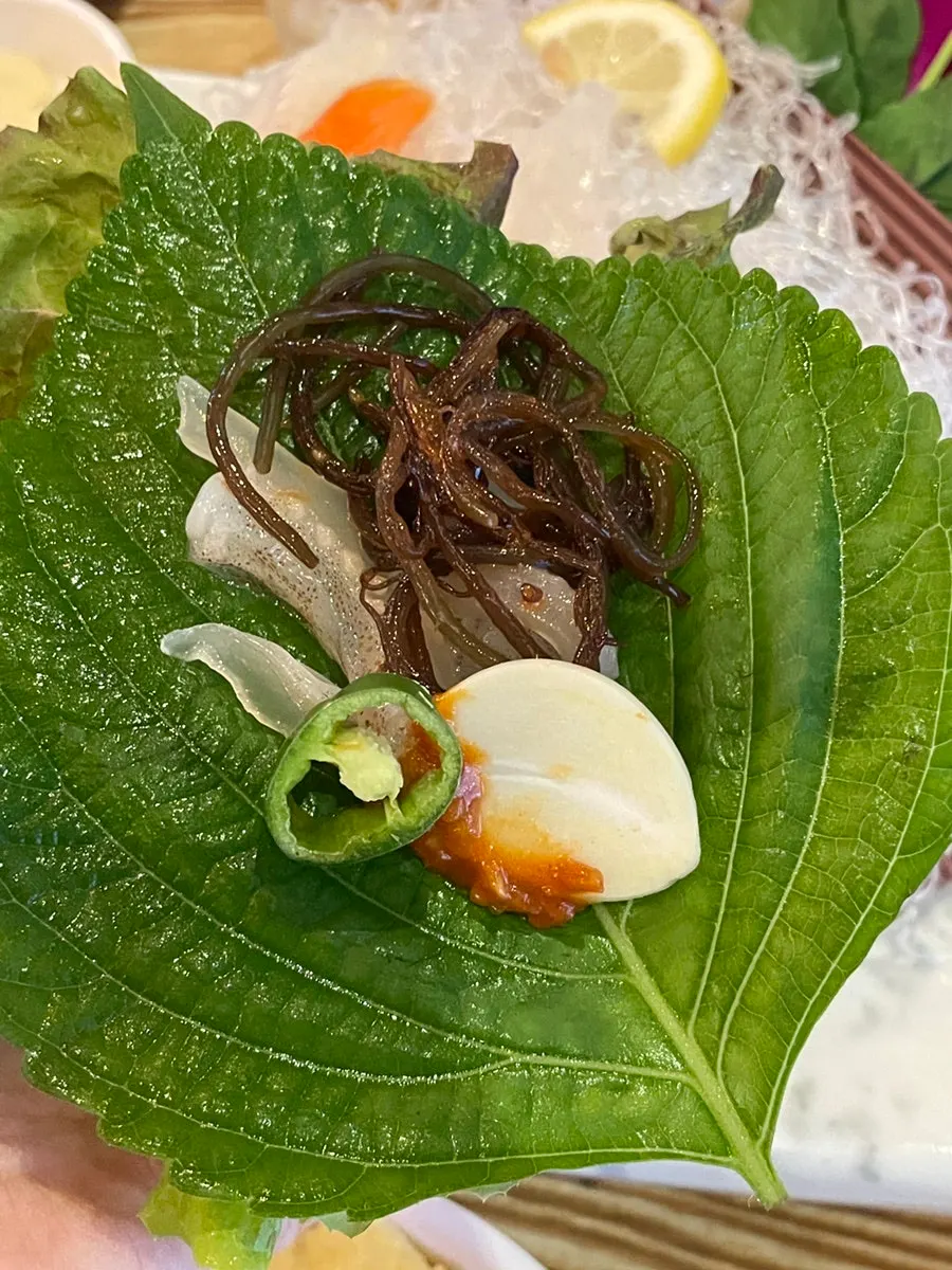 Close-up of chewy squid sashimi