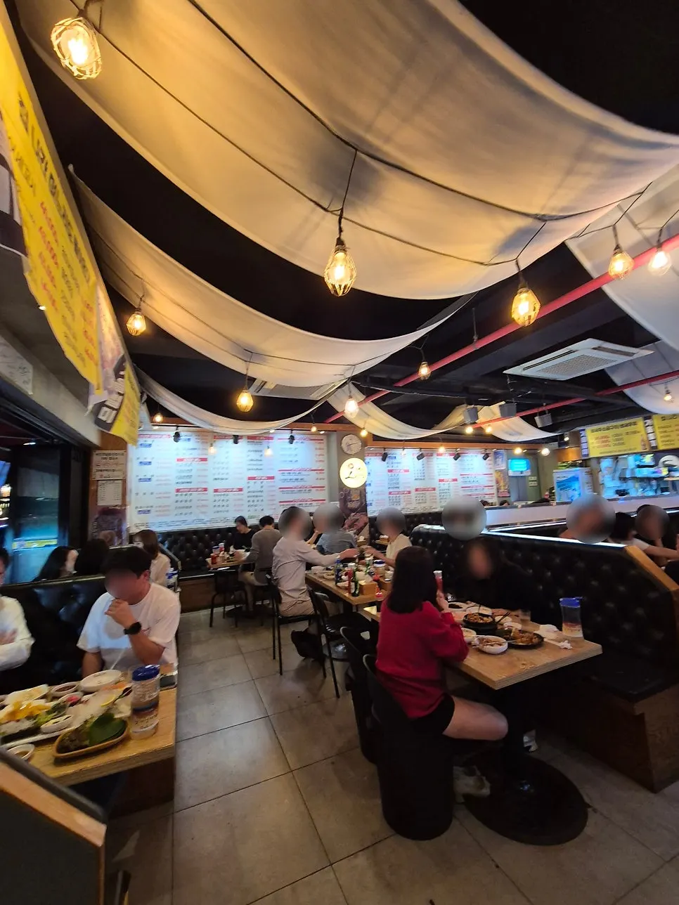 Interior full of customers on a weekday evening