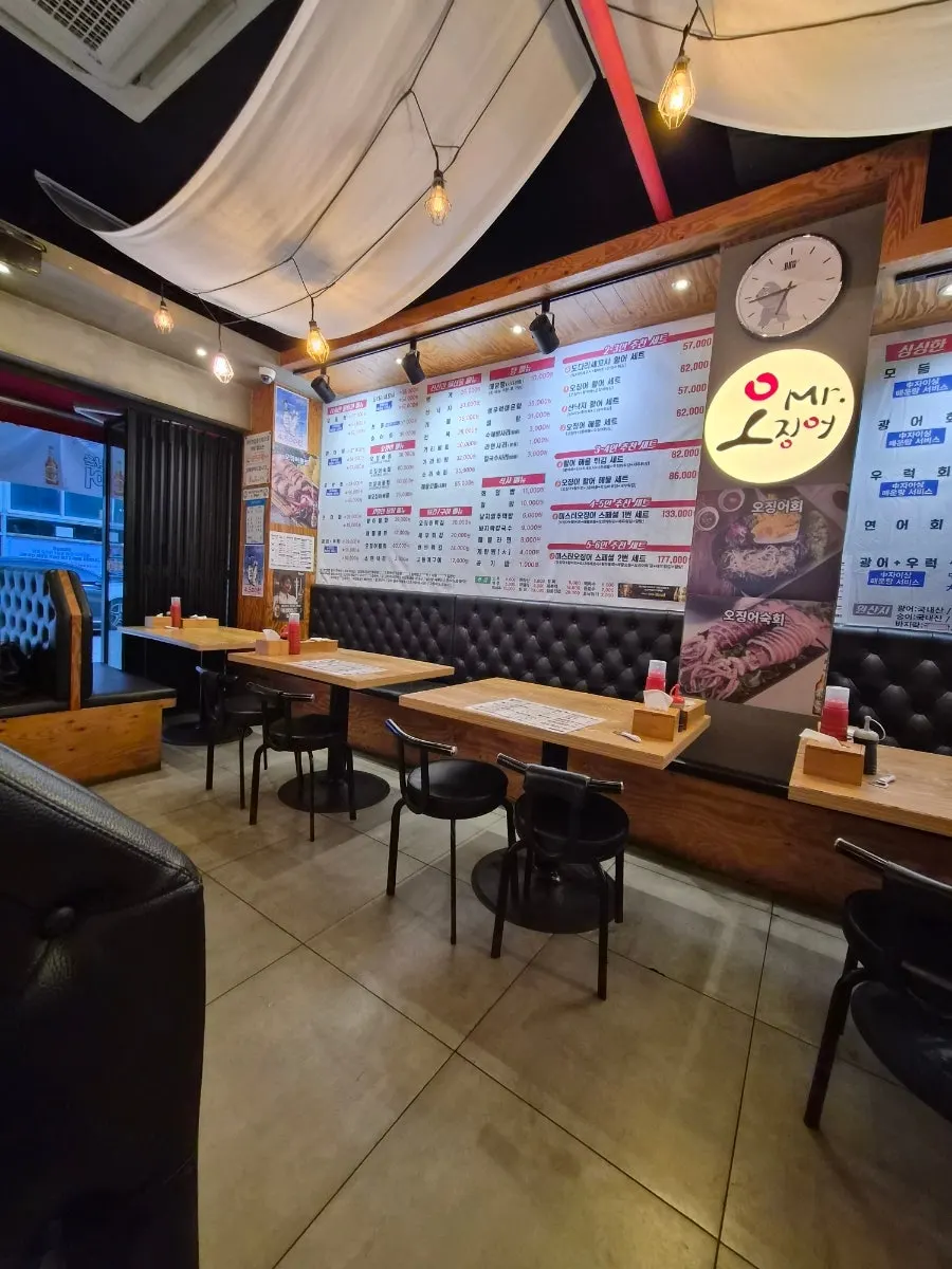 Interior of Mr. Squid with booth-style seating