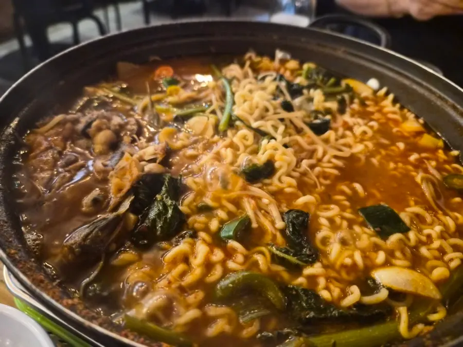 Spicy stew finished off with added ramen noodles