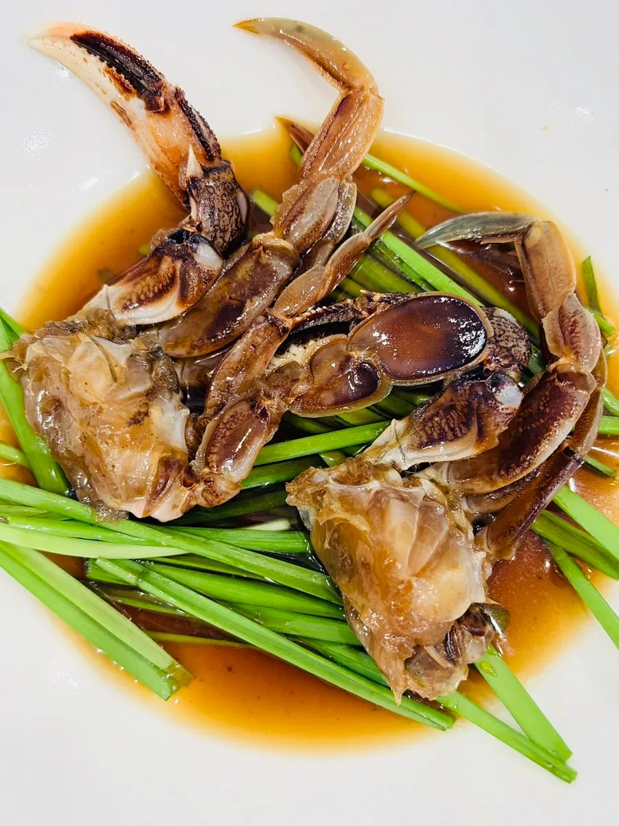 Side dishes including steamed abalone and soy-marinated raw crab