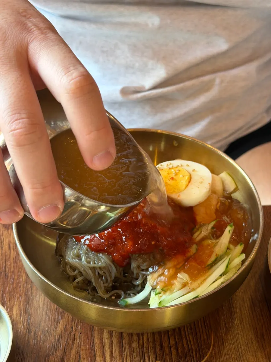 Bibim naengmyeon served with ribs