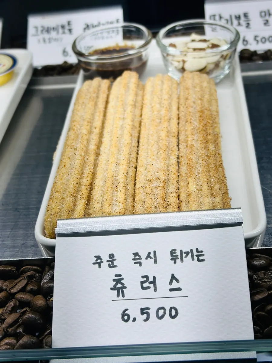 Chocolate churros enjoyed with coffee