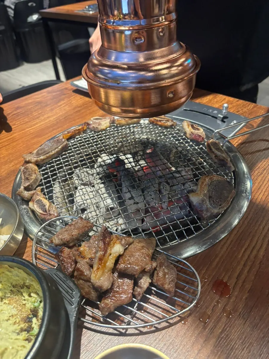 A piece of fresh beef ribs paired with pickled radish