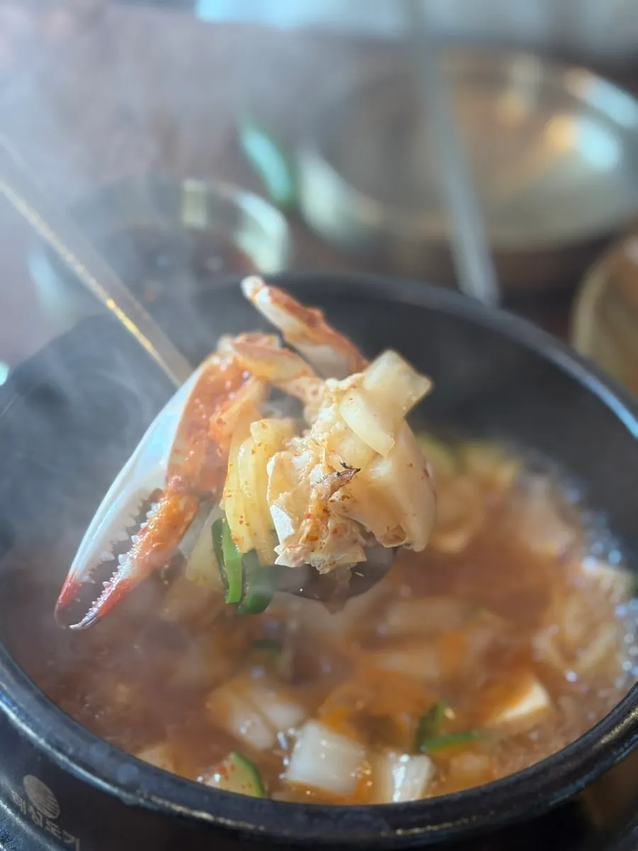A bite of soaenggalbi paired with side dishes