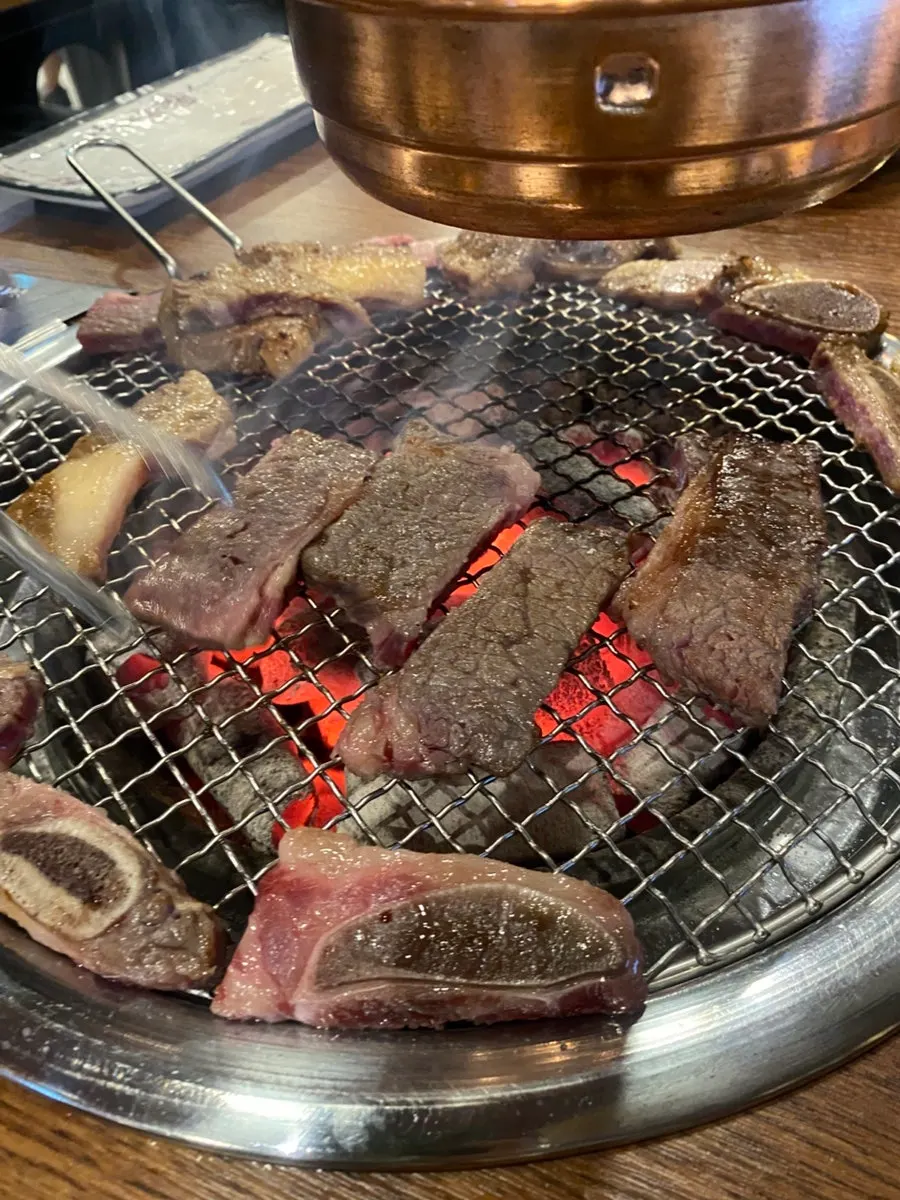 Marinated ribs cooking on the grill