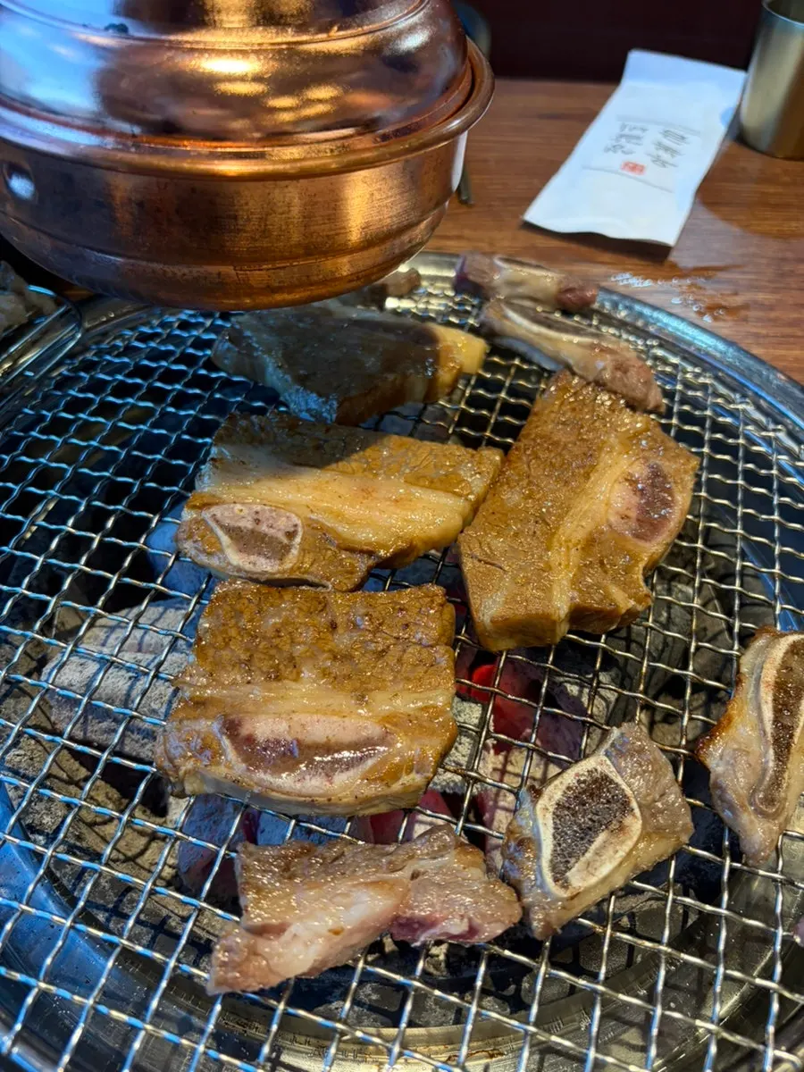 A fully grilled piece of beef fresh rib