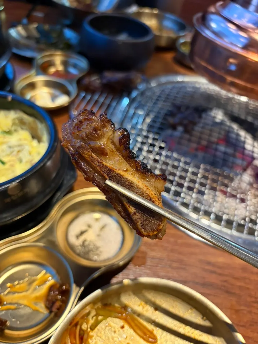 Marinated ribs paired with mustard leaf kimchi