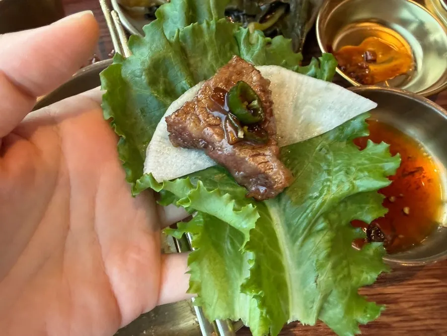 Mul naengmyeon eaten with beef ribs