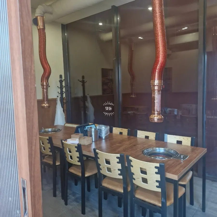 매장에 준비된 일회용 앞치마