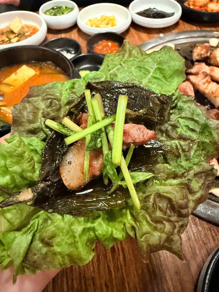 Cross-section of golden-brown grilled pork neck