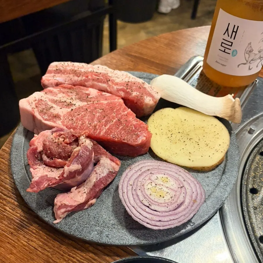 Plate of pork assorted set with pork neck, pork belly, and whole galmaegisal