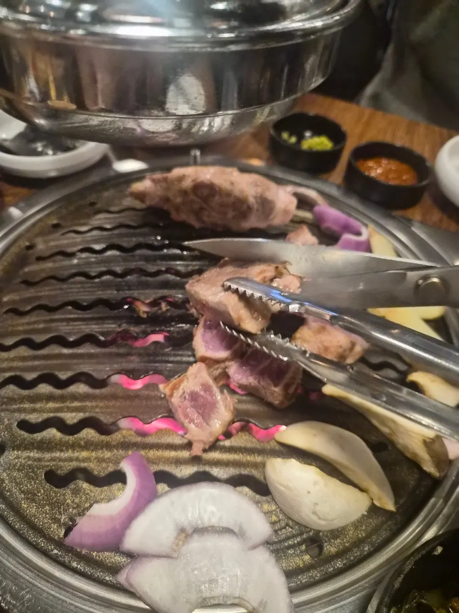 Well-grilled pork neck with a nice sear