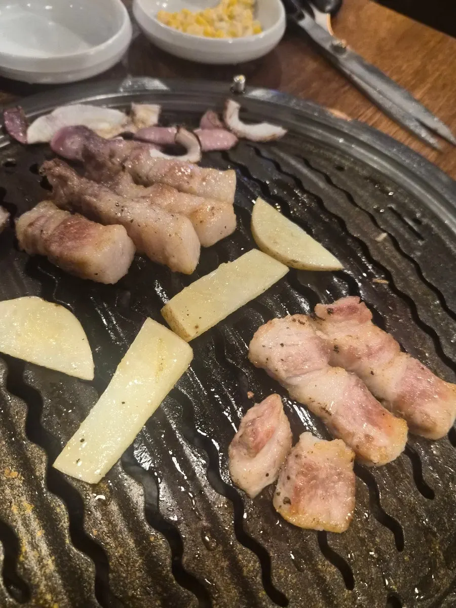 A grilled piece of odol pork belly