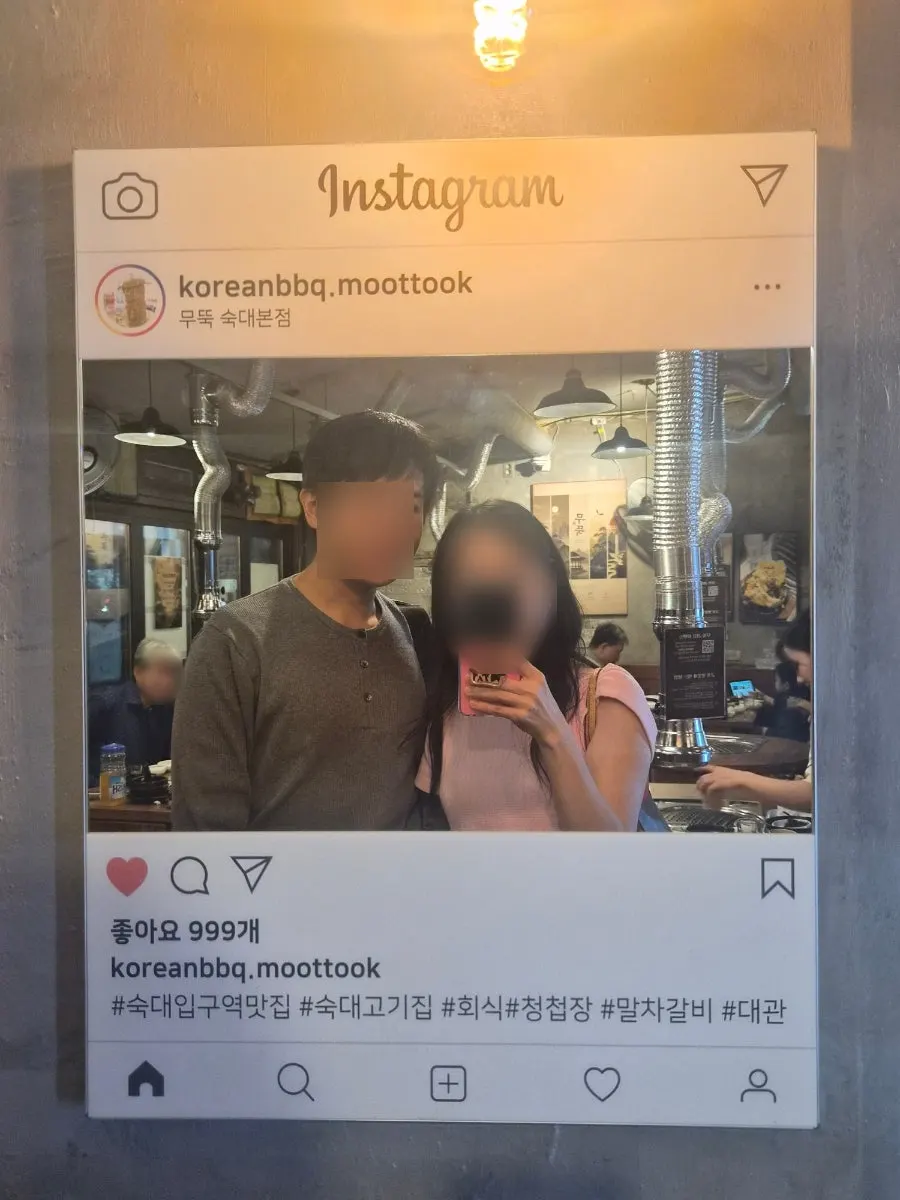 Mirror inside the restaurant shaped like an Instagram frame