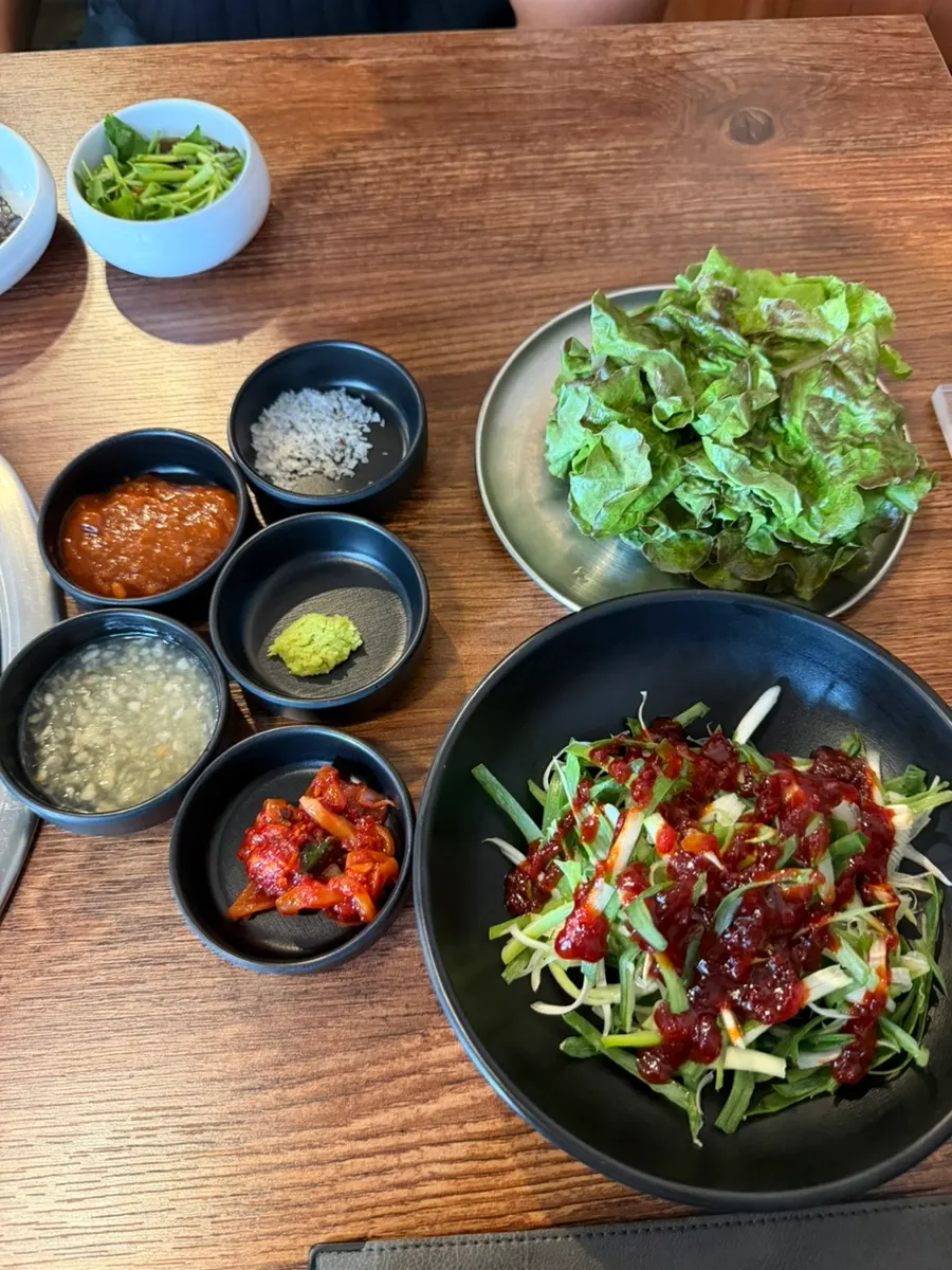 Close-up of the minari soy sauce dish