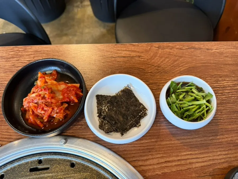Table set with various sauces and side dishes