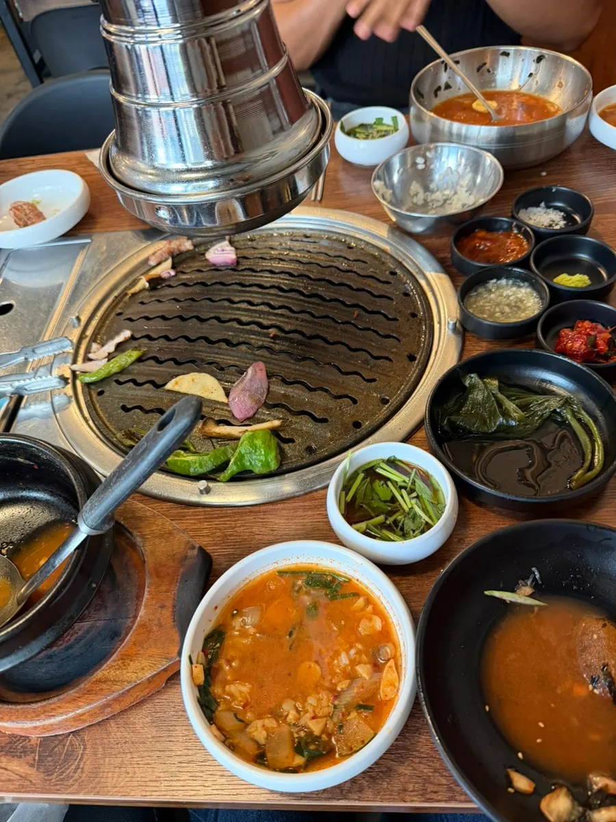 Full table spread of meat and side dishes