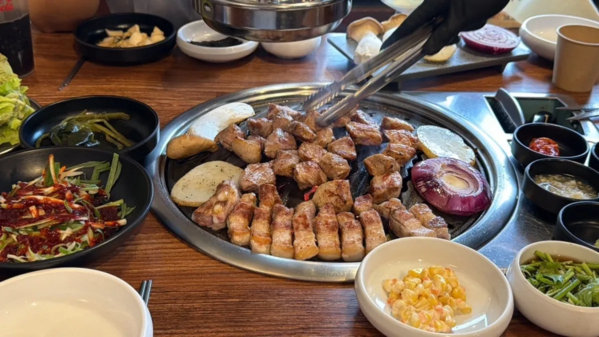 Pork neck and belly grilling on the pan