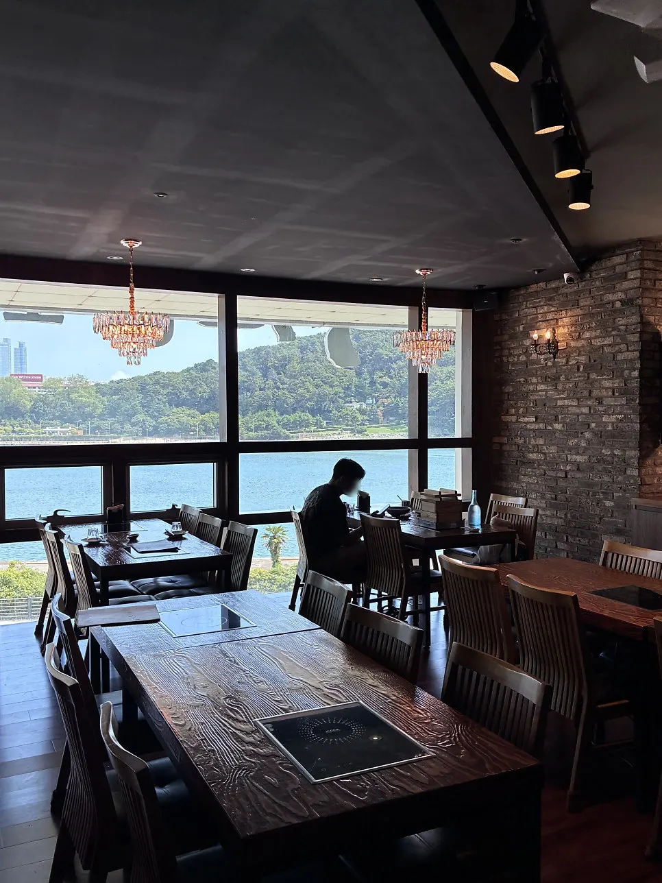 Mugen's dining hall with high ceilings and natural light