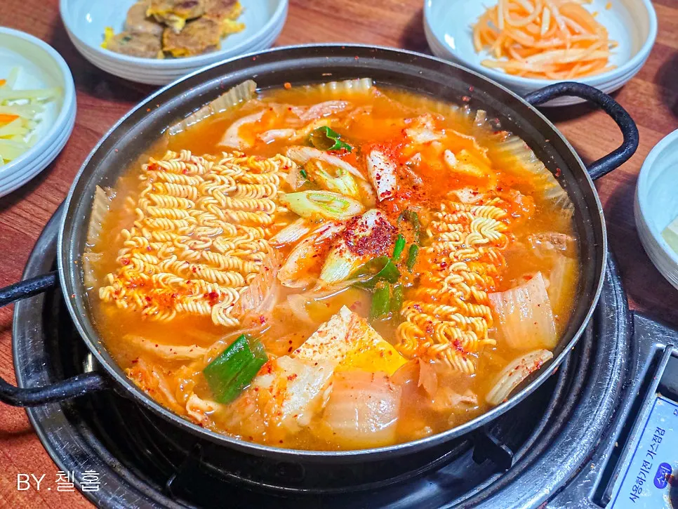 Kimchi jjigae for two, simmered at the table