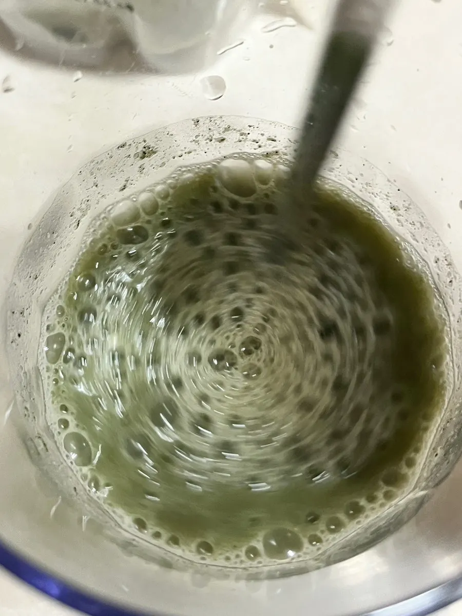 A cup of mugwort soy milk mixed thick