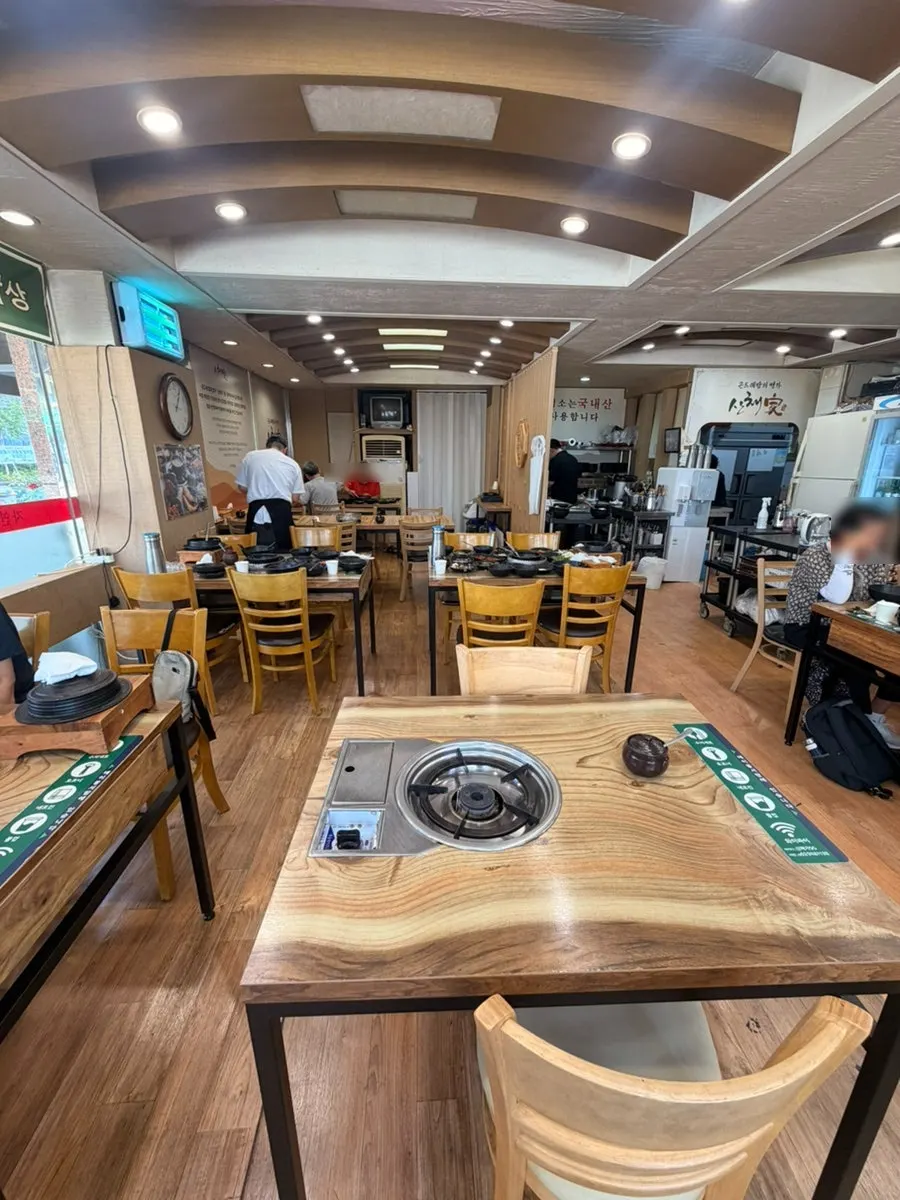 Wood-toned interior of Sanchaega Hanjeongsik