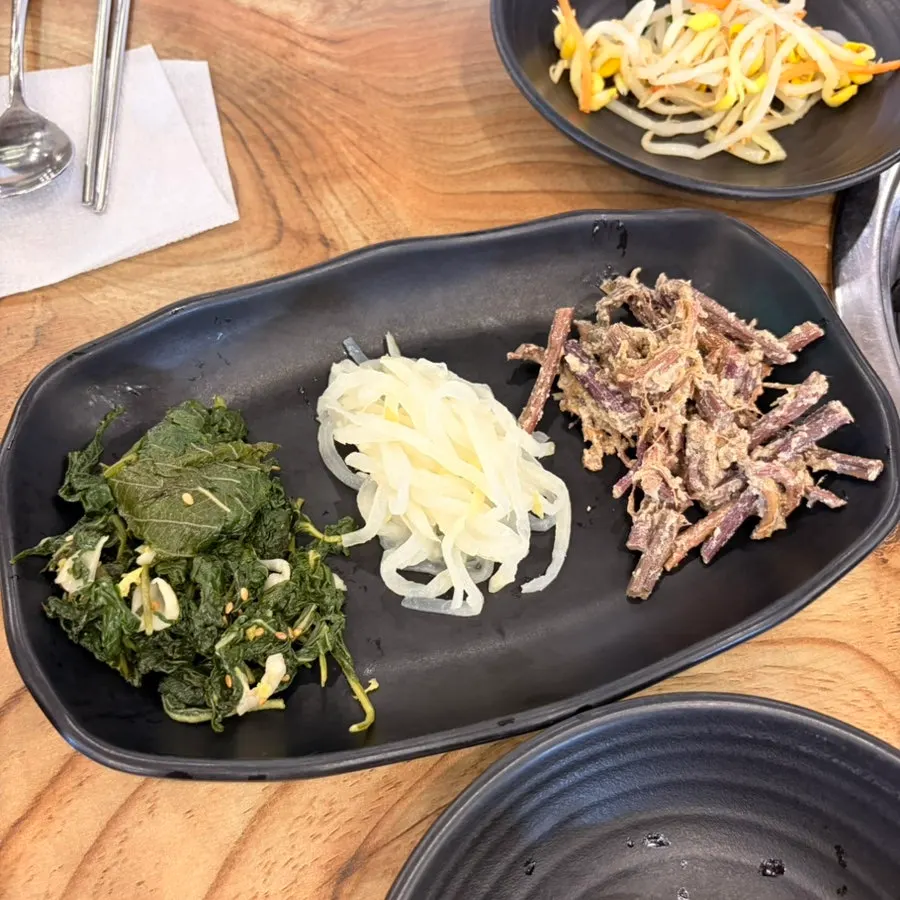 Plate of homemade seasoned vegetable side dishes