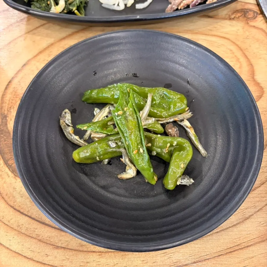 Stir-fried anchovies with shishito peppers and kimchi