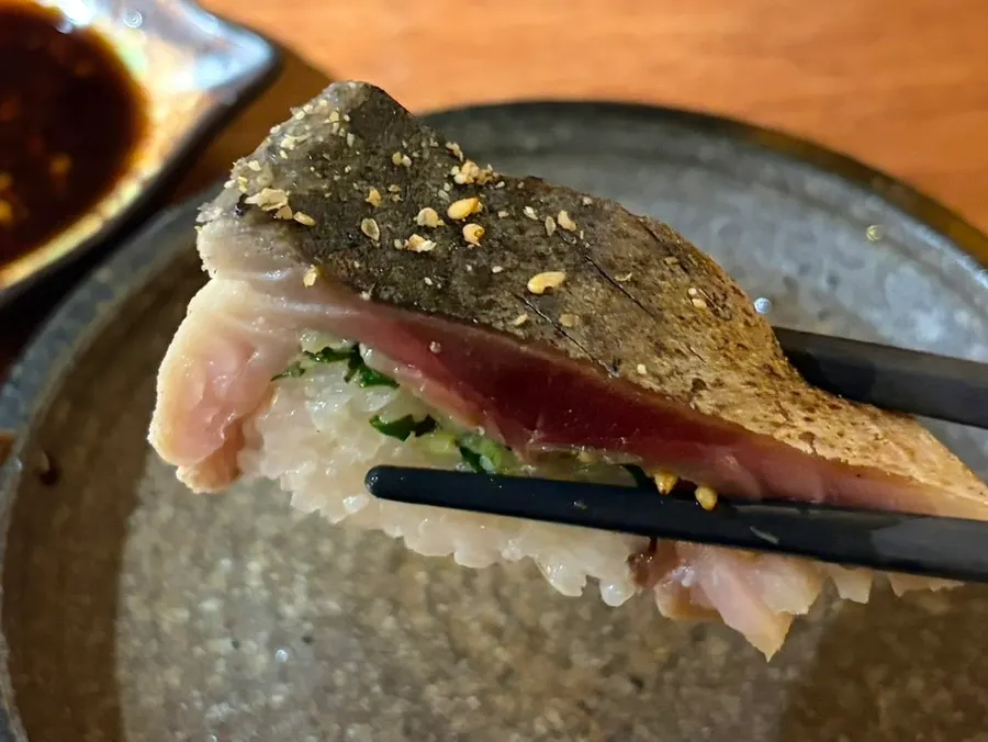 Cross-section of torch-seared mackerel bongcho sushi