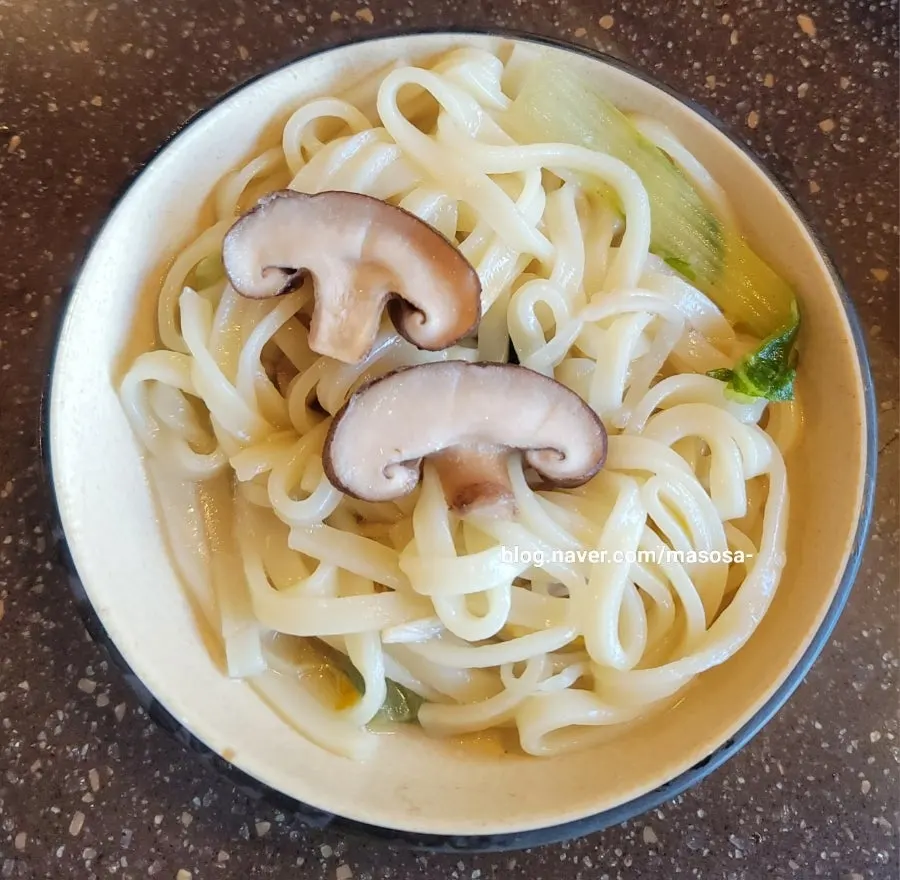 Kalguksu cooked in seafood broth
