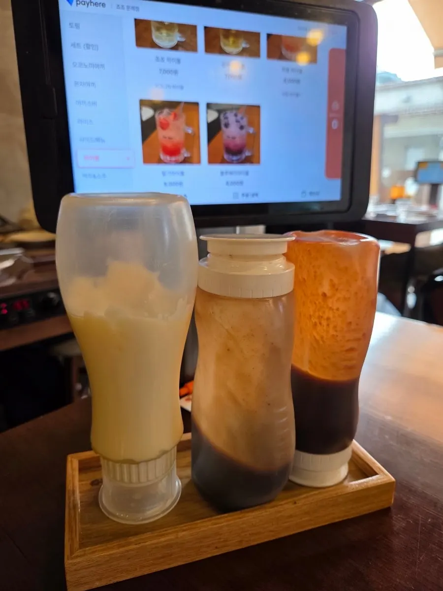 Mayonnaise, teriyaki, and buldak sauce set on the table