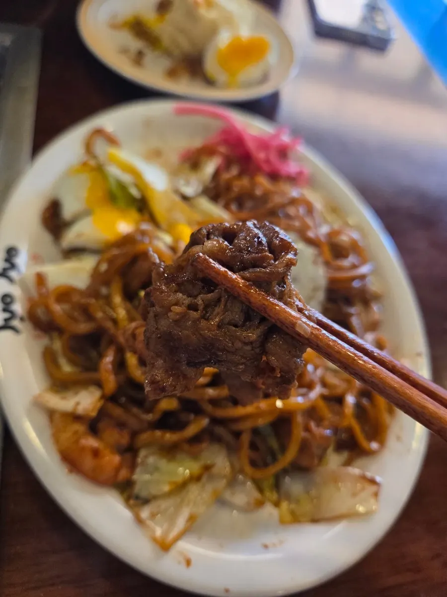 Yakisoba noodles and toppings on the griddle
