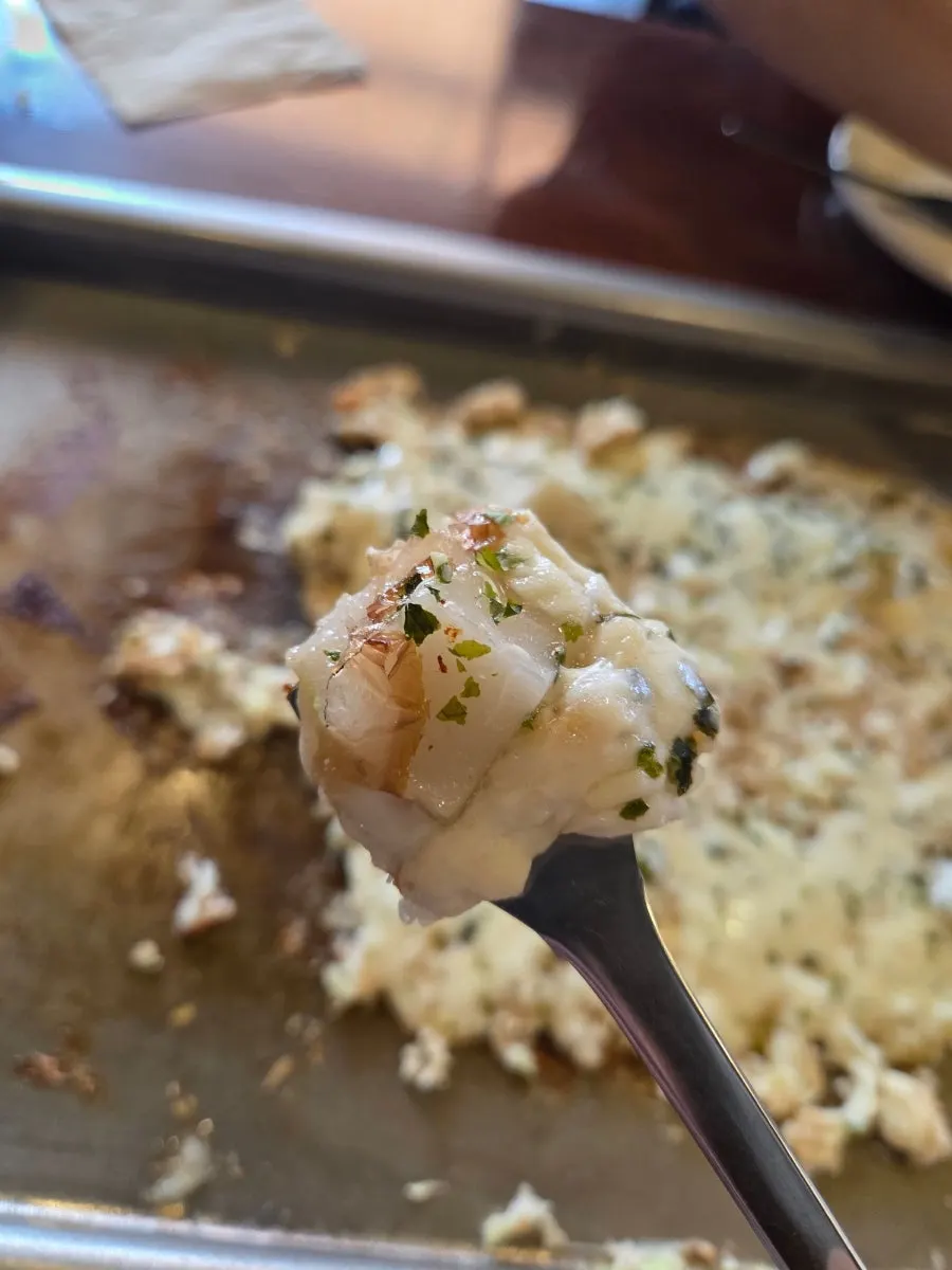 A bite of yakisoba with the egg yolk popped