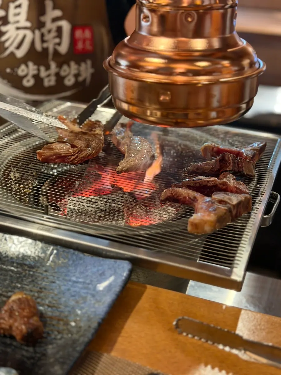 Charcoal-grilled lamb ribs eaten with just a dip of salt
