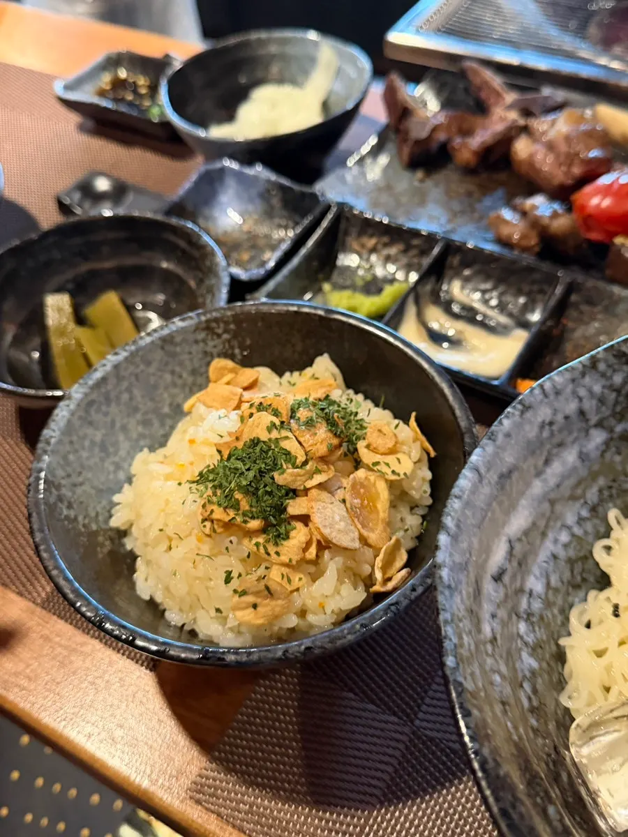 Grilled vegetables and seasonal fruit served alongside