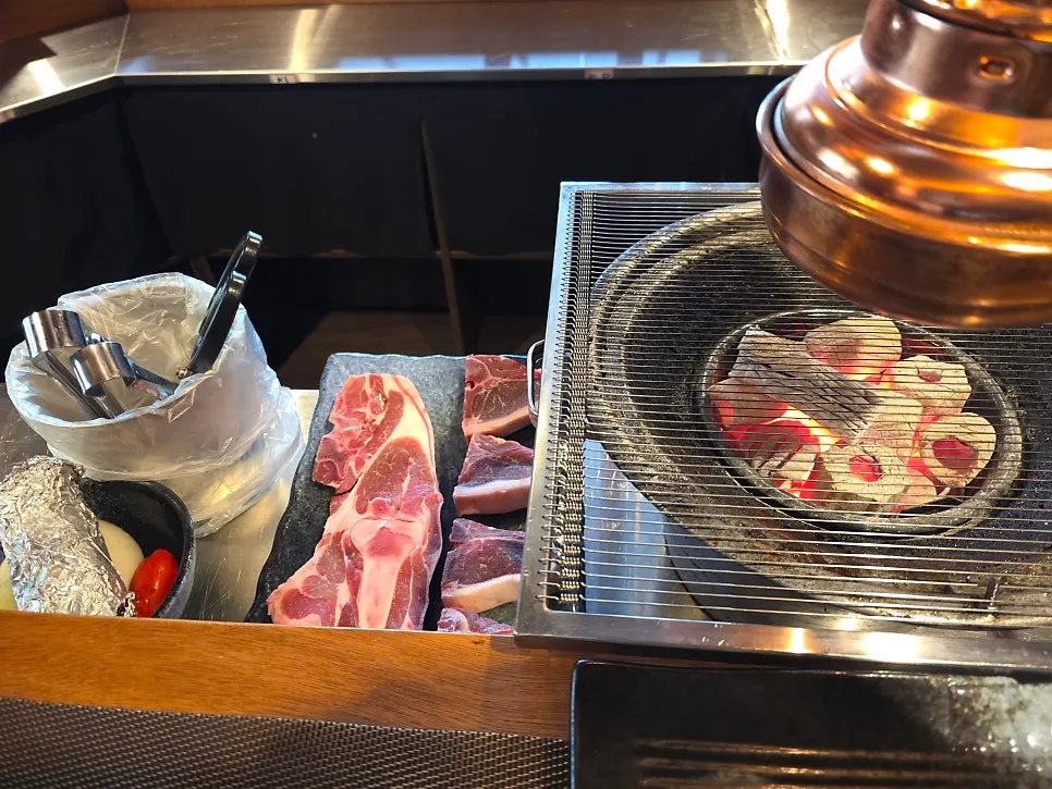 Raw T-bone lamb cut showing vivid marbling