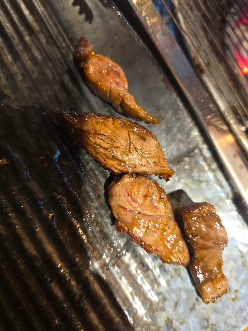 Charcoal-grilled lamb rib rack