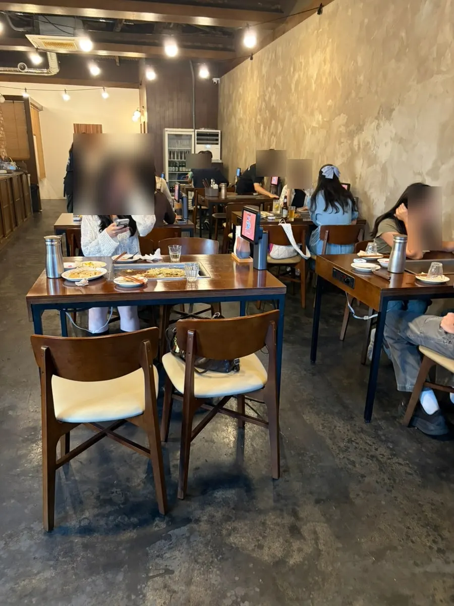 Restaurant interior with teppanyaki tables