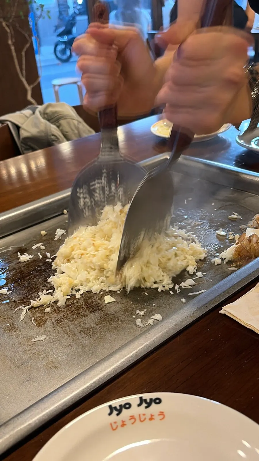 Monjayaki cooking process right in front of diners