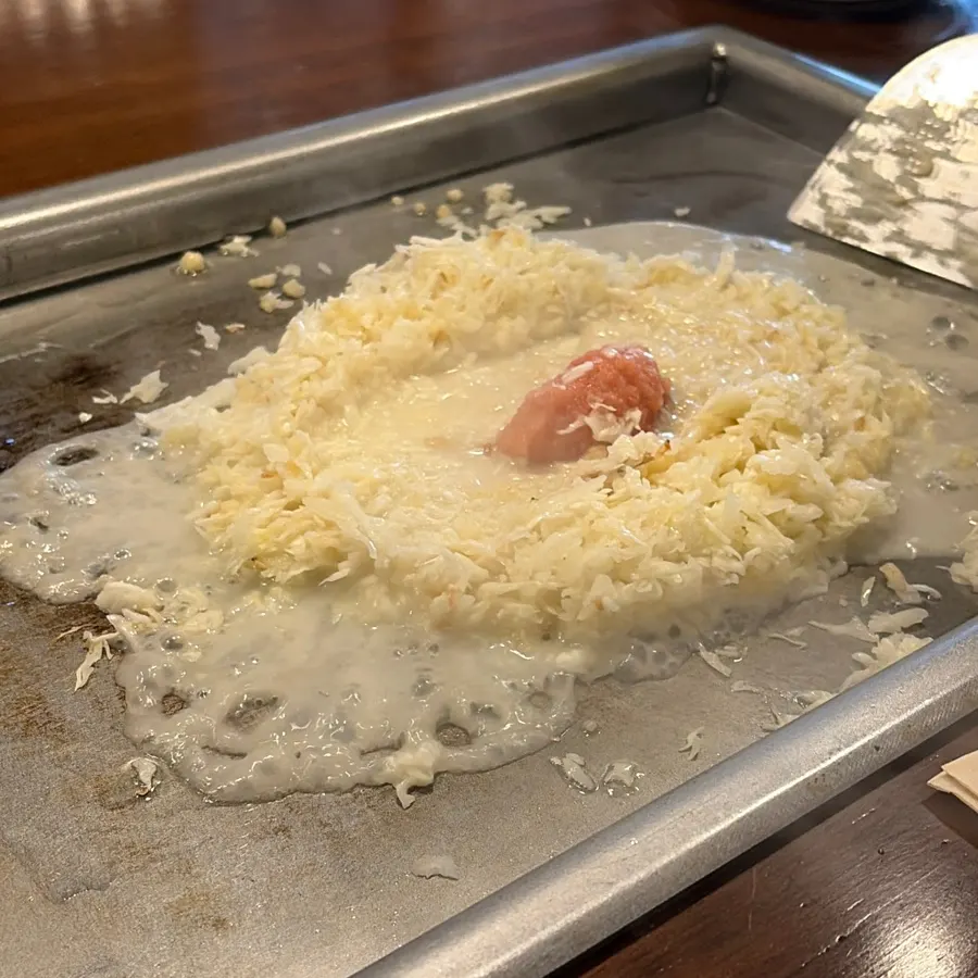 Teppanyaki monjayaki just before it is finished