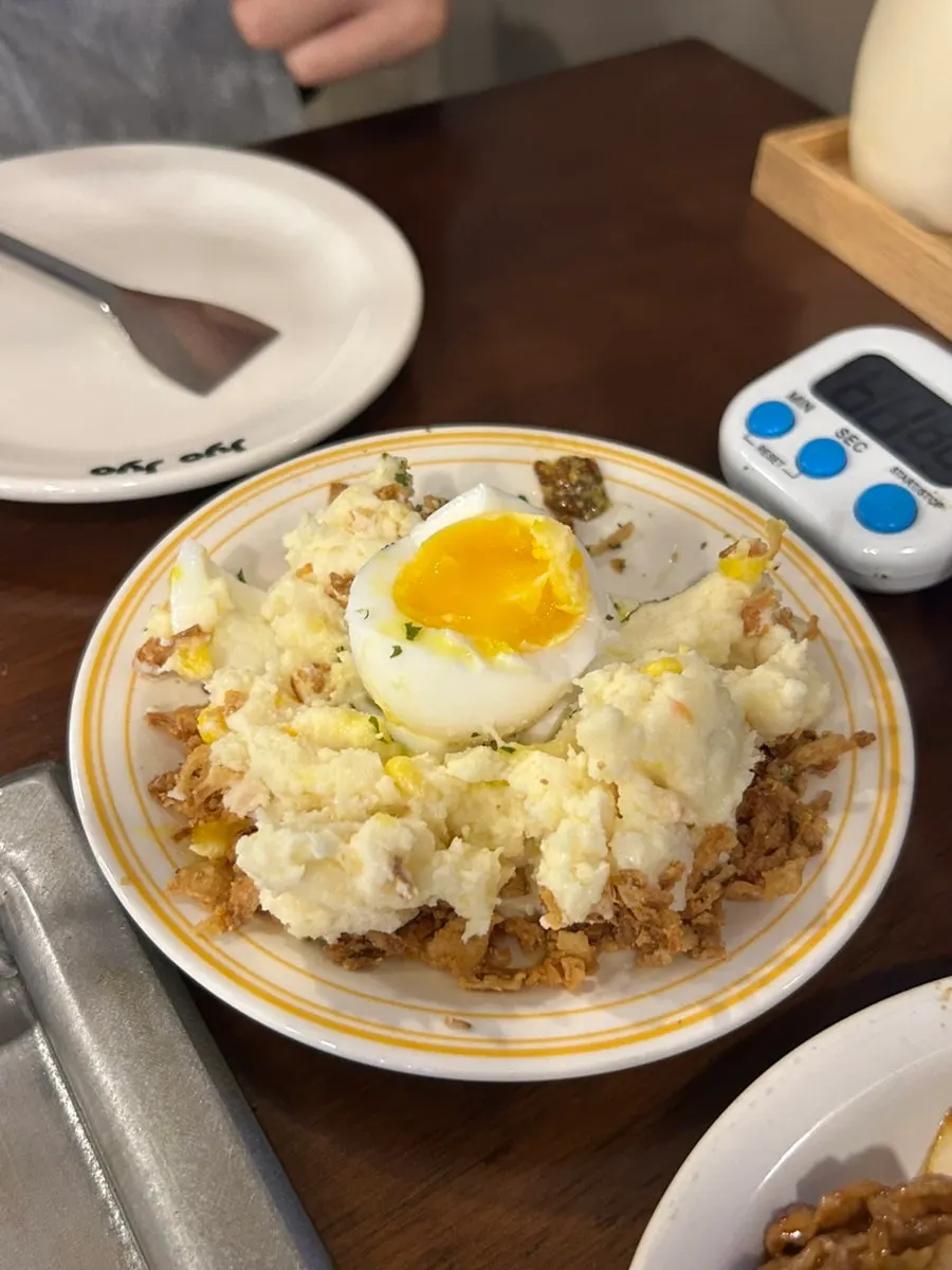 Mixing the waterfall potato with a spoon