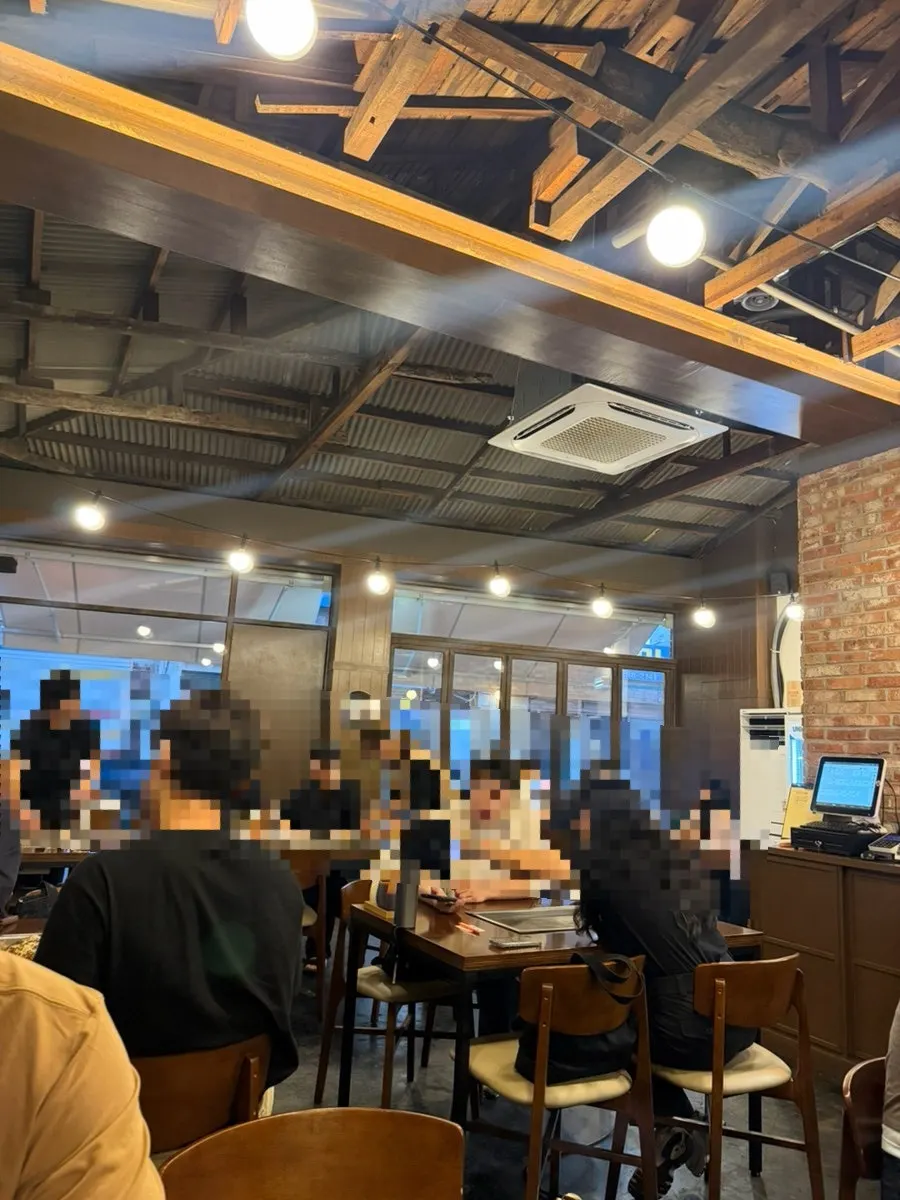 Restaurant interior with view of the open kitchen